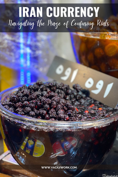 Dried fruits in syrup displayed in a spacious glass bowl, accompanied by its price in Iranian currency, rials.