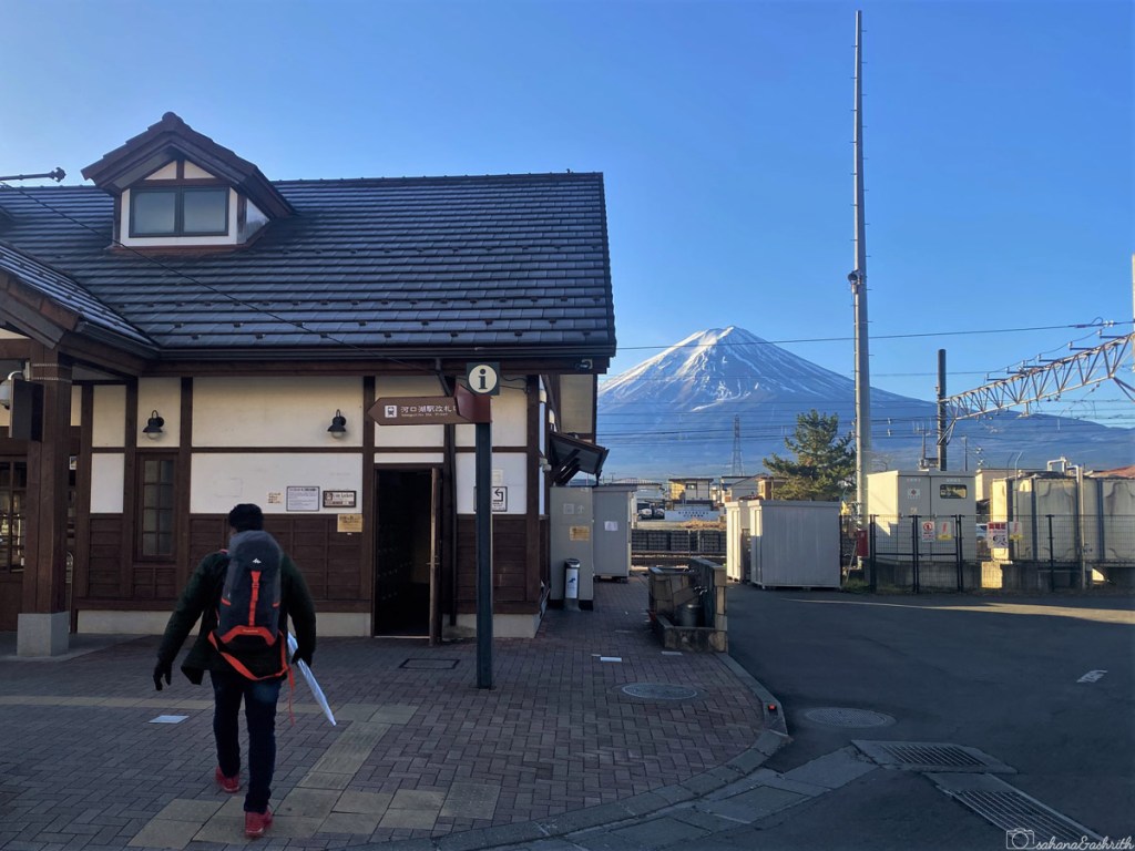 snow capped mountain Fuji in the background of kawaguchiko transit hub