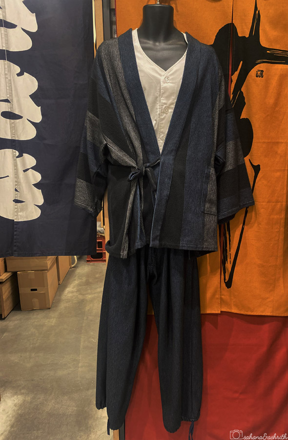 indigo, black and grey striped pure soft cotton pant and loose topwear set called Samue and jinbei in a Japanese market