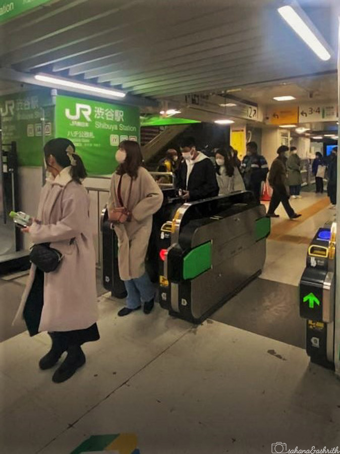 passengers passingthrough japan public transport ticket gateways