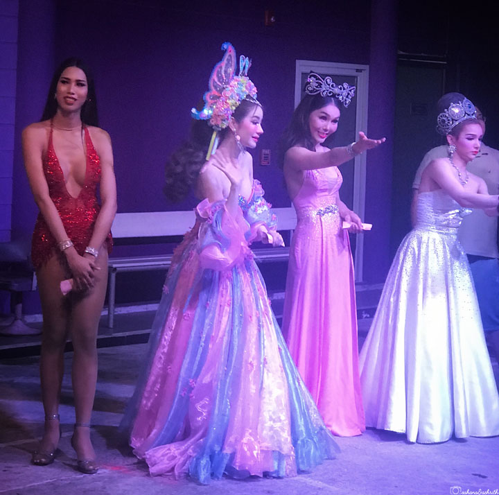 four lady boys in glamorous clothing at cabaret show in phuket, thailand