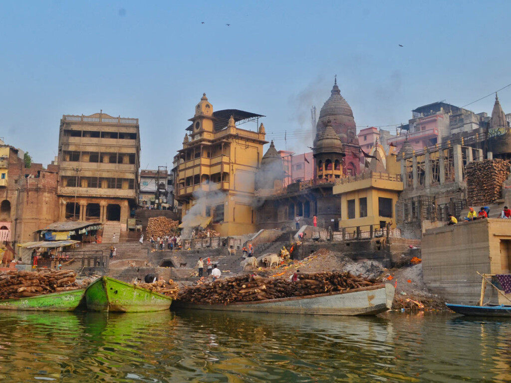 mani karnika ghat of varanasi with dead bodies in fire