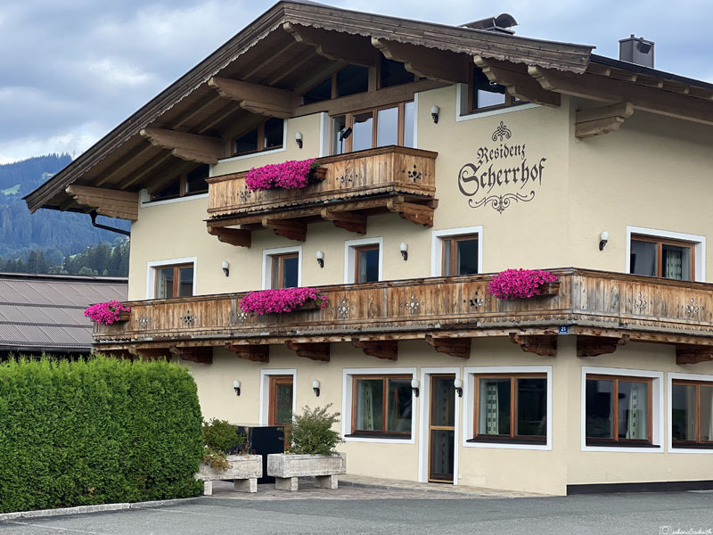 local guesthouse in austria tirol with sloped roof and window flower box