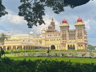 grand mysore palace with garden in front