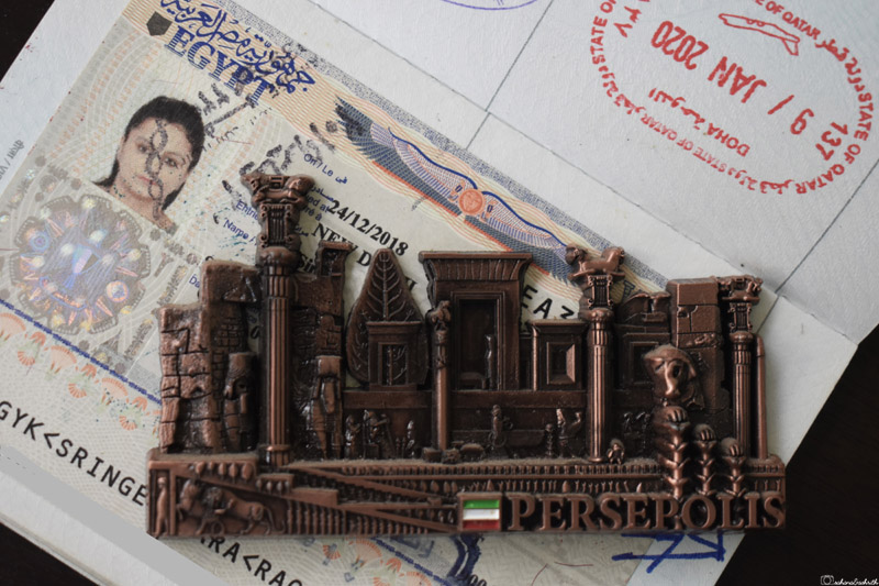 magnet sticker of persepolis in iran kept on egypt visa sticker  on an indian passport