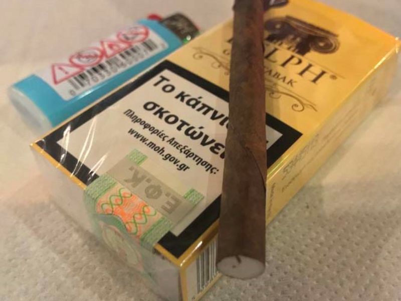 traditional greek ionic capital icon on a cigarette pack in greece