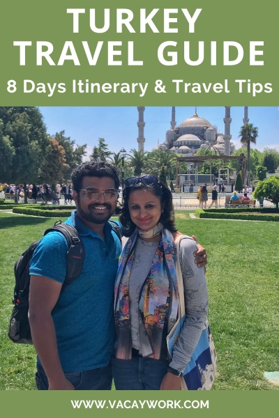 vacaywork authors sahana and ashrith standing n front of blue mosque clicked by a carpet owner