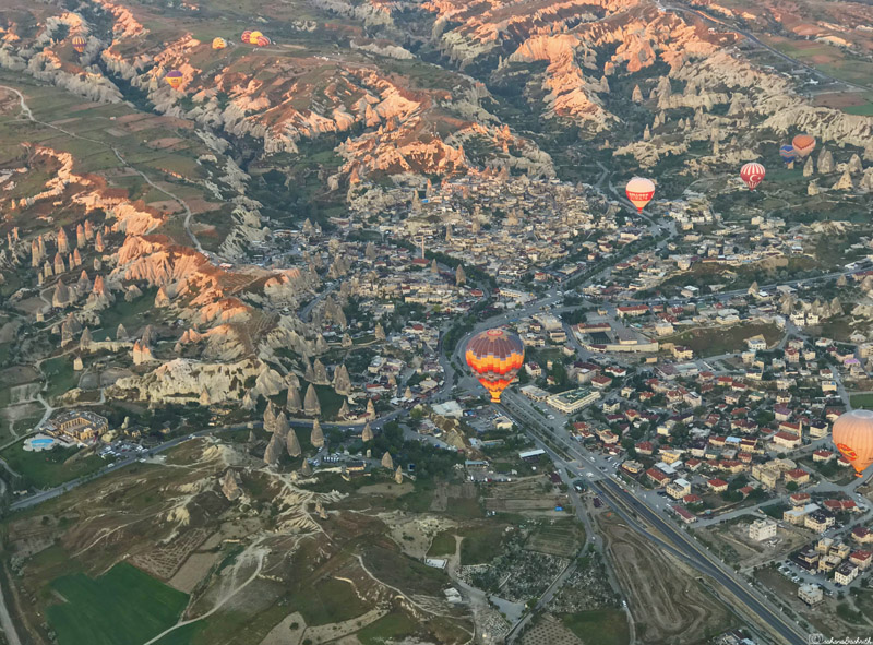 aerial view of cappadocia from hot air balloon during sunrise