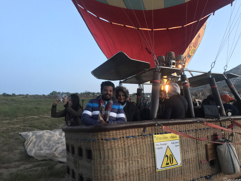 vacaywork authors ashrith and sahana in hot air balloon cradle along with 14 other passengers at cappadocia