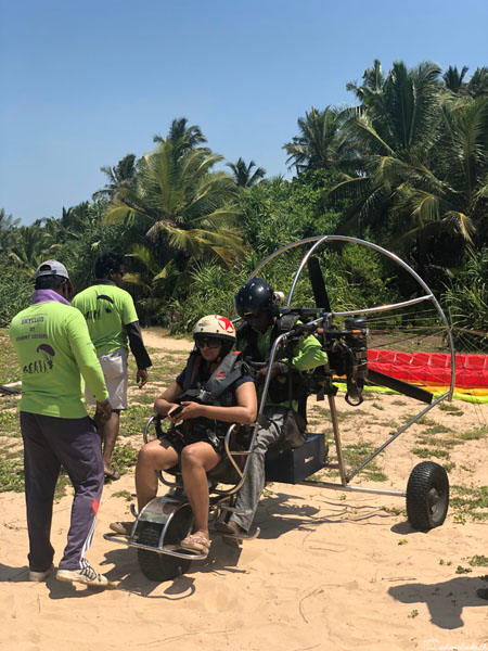 vacaywork author sahana preparing to take off in paramotor at bentota