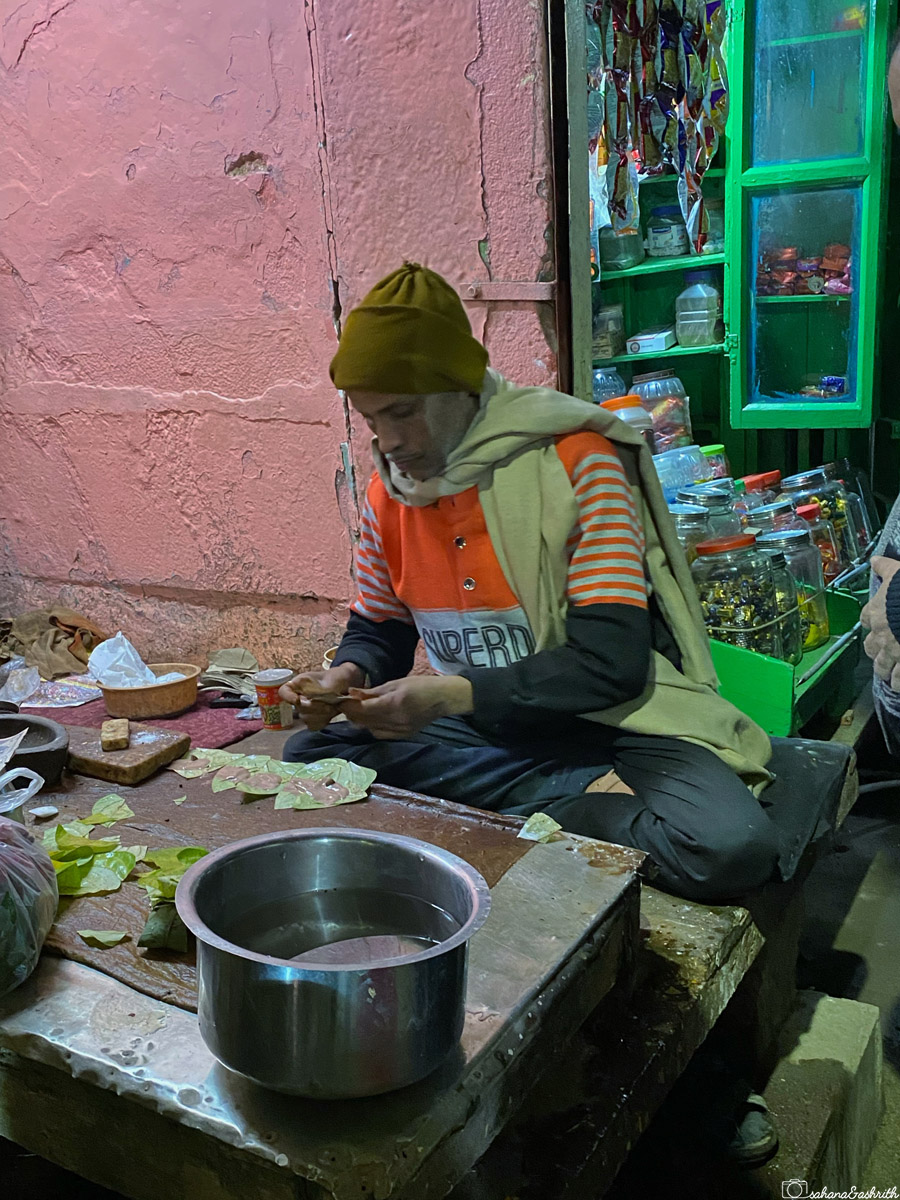 A vendor preparing paan at his stall in Varanasi.