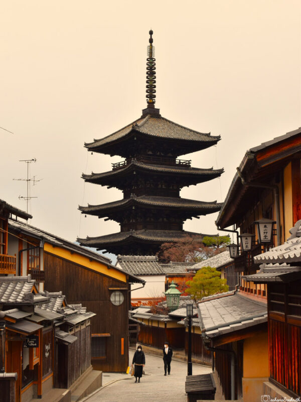 conic Yasaka Pagoda in Kyoto, surrounded by traditional wooden buildings, offering a glimpse into Japan's historical architecture