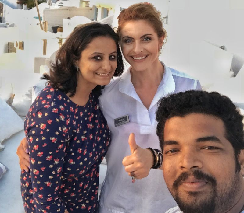 vacaywork authors with a beautiful greek lady at Firostefani in Greece