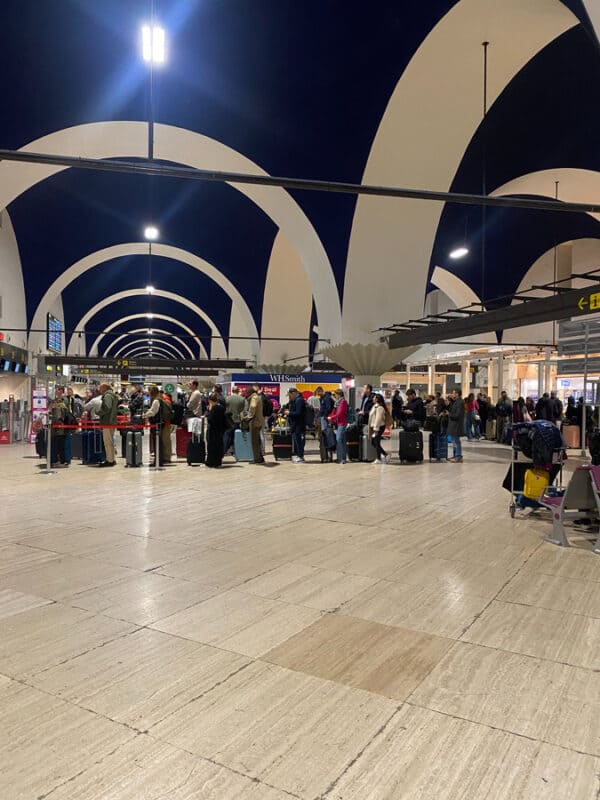seville airport passenger line early in the morning