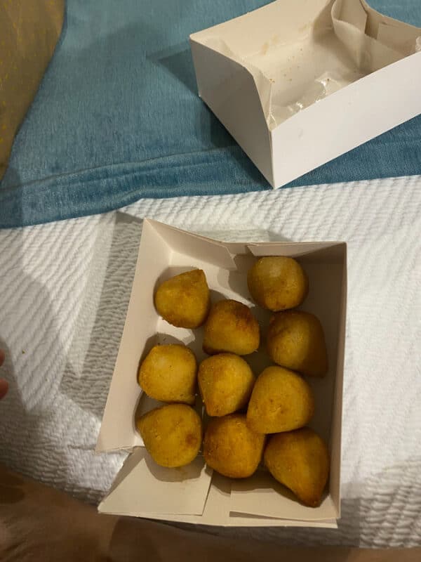 Box of freshly fried veg croquettes in Portugal