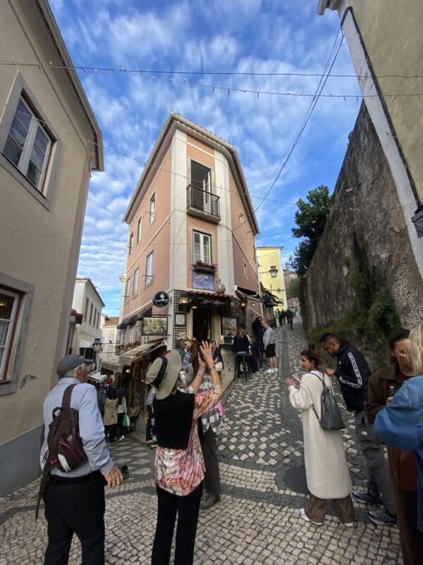 Rua das Padeiras with cobbled streets, narrow lanes and tourists in Sintra Historic Centre