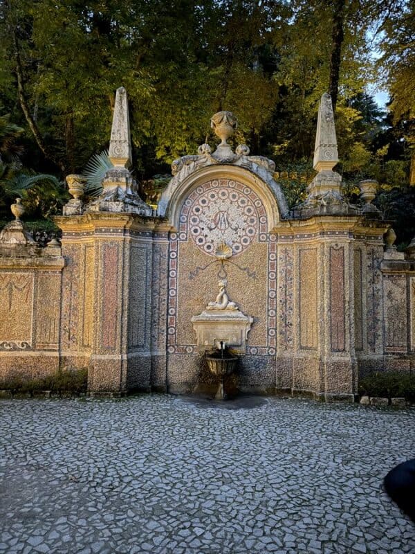 Quinta da Regaleira mosaic fountain of abudance surrounded by trees