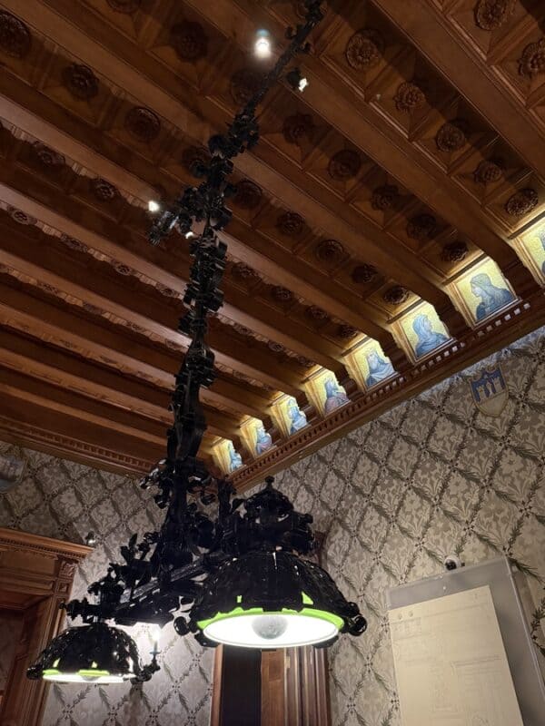 Quinta da Regaleira interior with ornate wooden ceiling and chandeliers