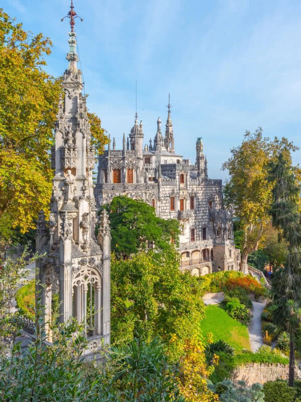 Quinta da Regaleira palace and garden framed by autumn trees