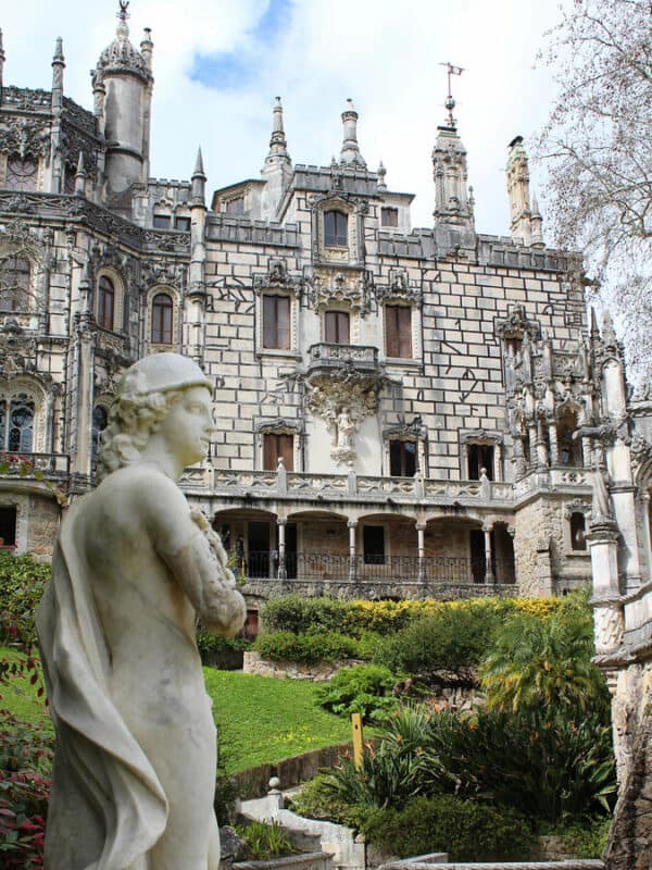 Quinta da Regaleira carved fountain set into a stone wall
